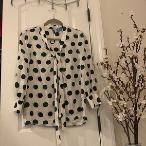Kate spade beautiful blouse.  Only worn a few times.  In brand new condition